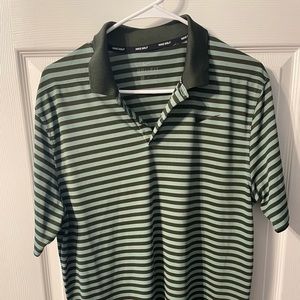 Nike Golf shirt. Green and black stripes. Size medium Smoke free.
